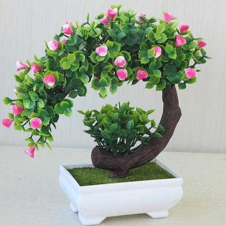 Plastic bonsai with fake flowers